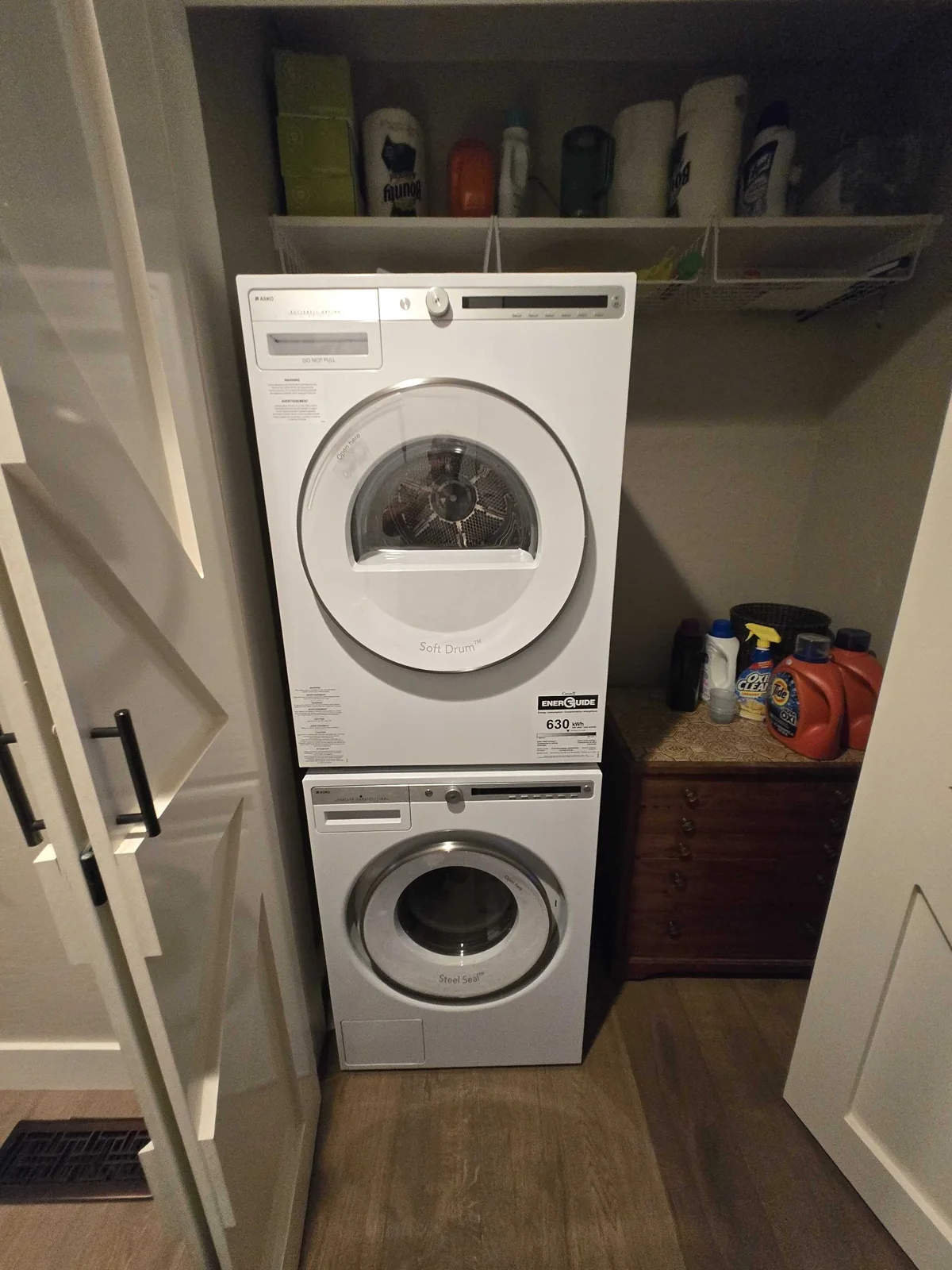 Stacked ASKO dryer and washer.