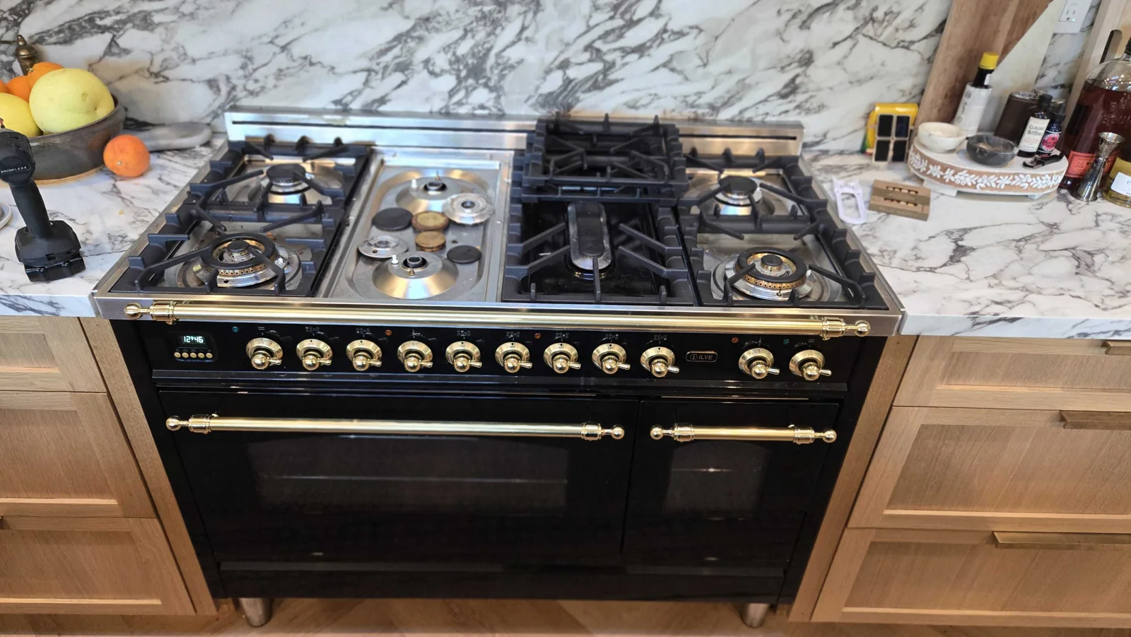 Black ILVE range photographed during a service visit.