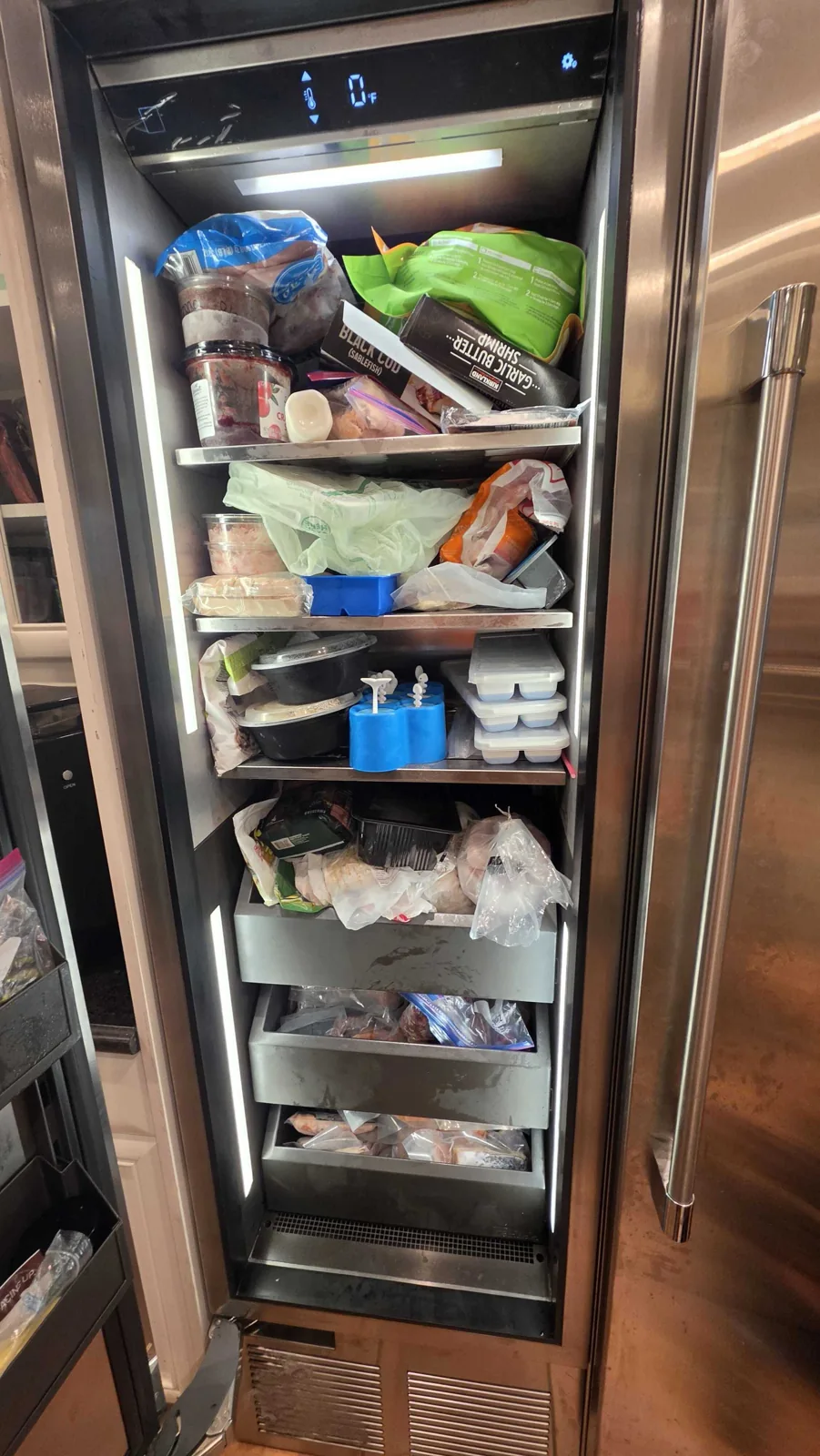 Built-in stainless-steel Perlick refrigerator and freezer with the doors closed.