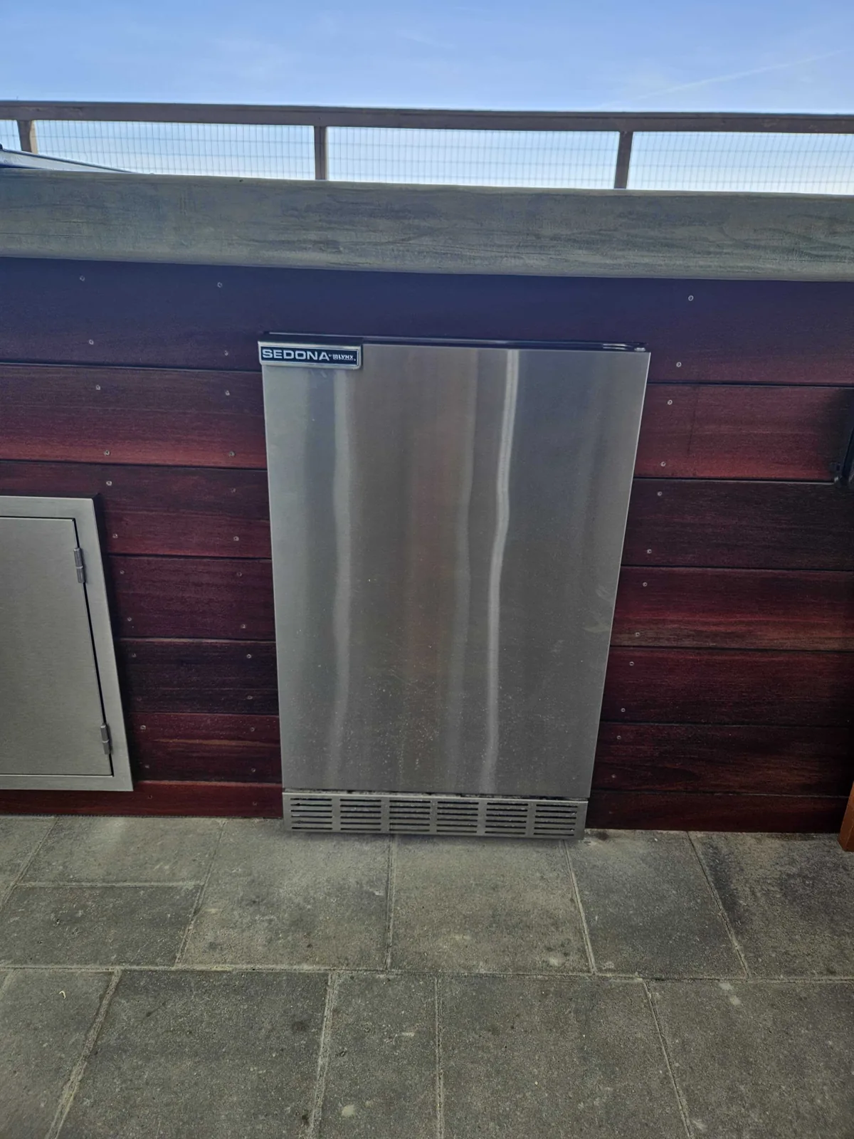 Built-in Scotsman undercounter ice maker with the door closed.