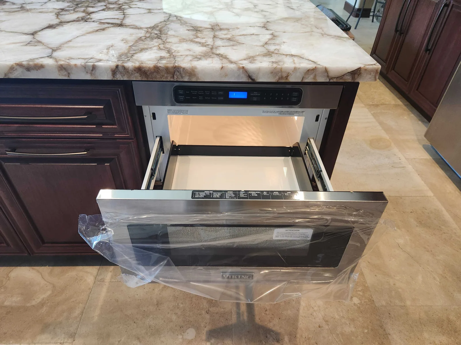 Viking warming drawer with its drawer open.