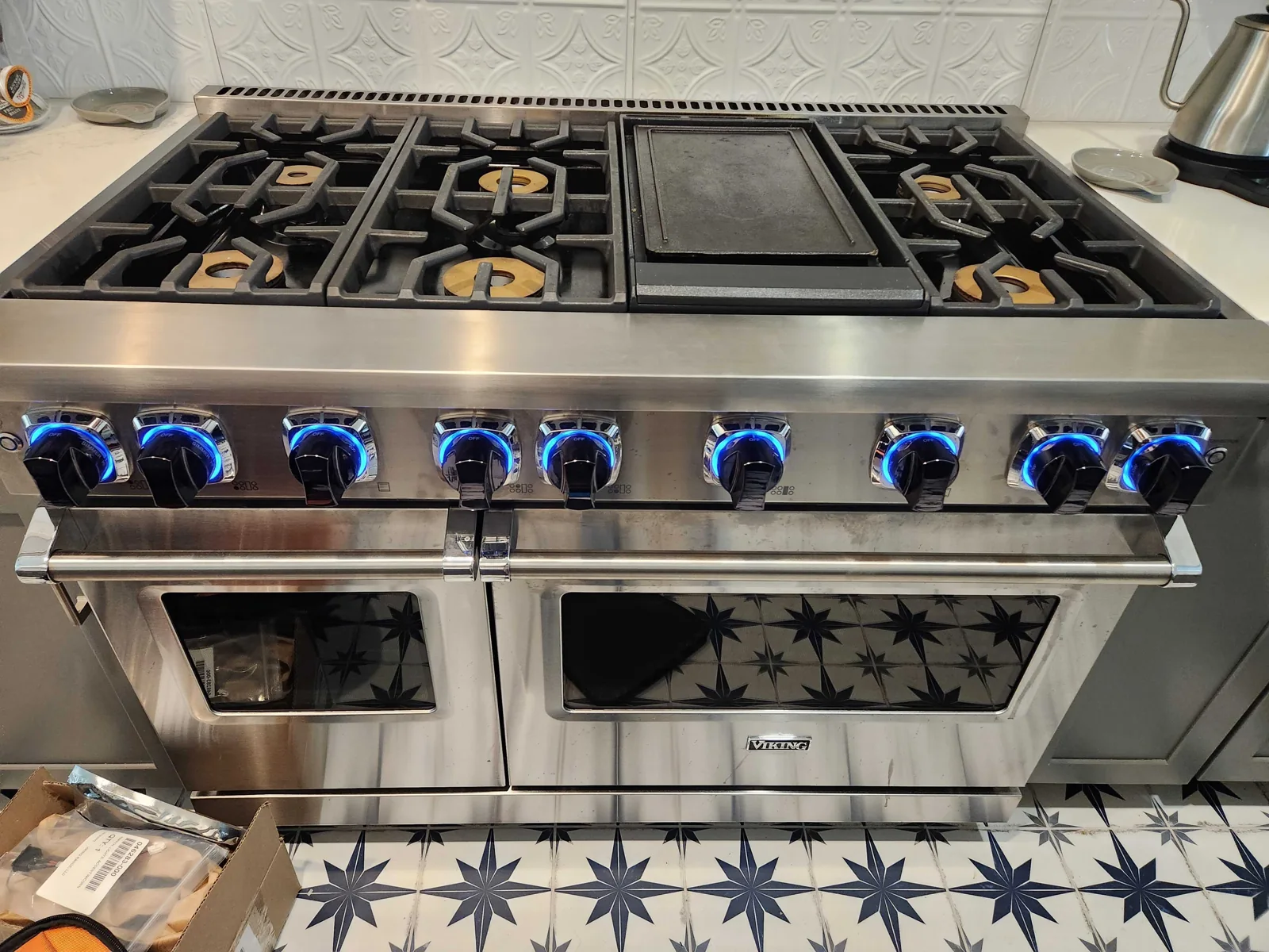 Viking gas range with illuminated control knobs.